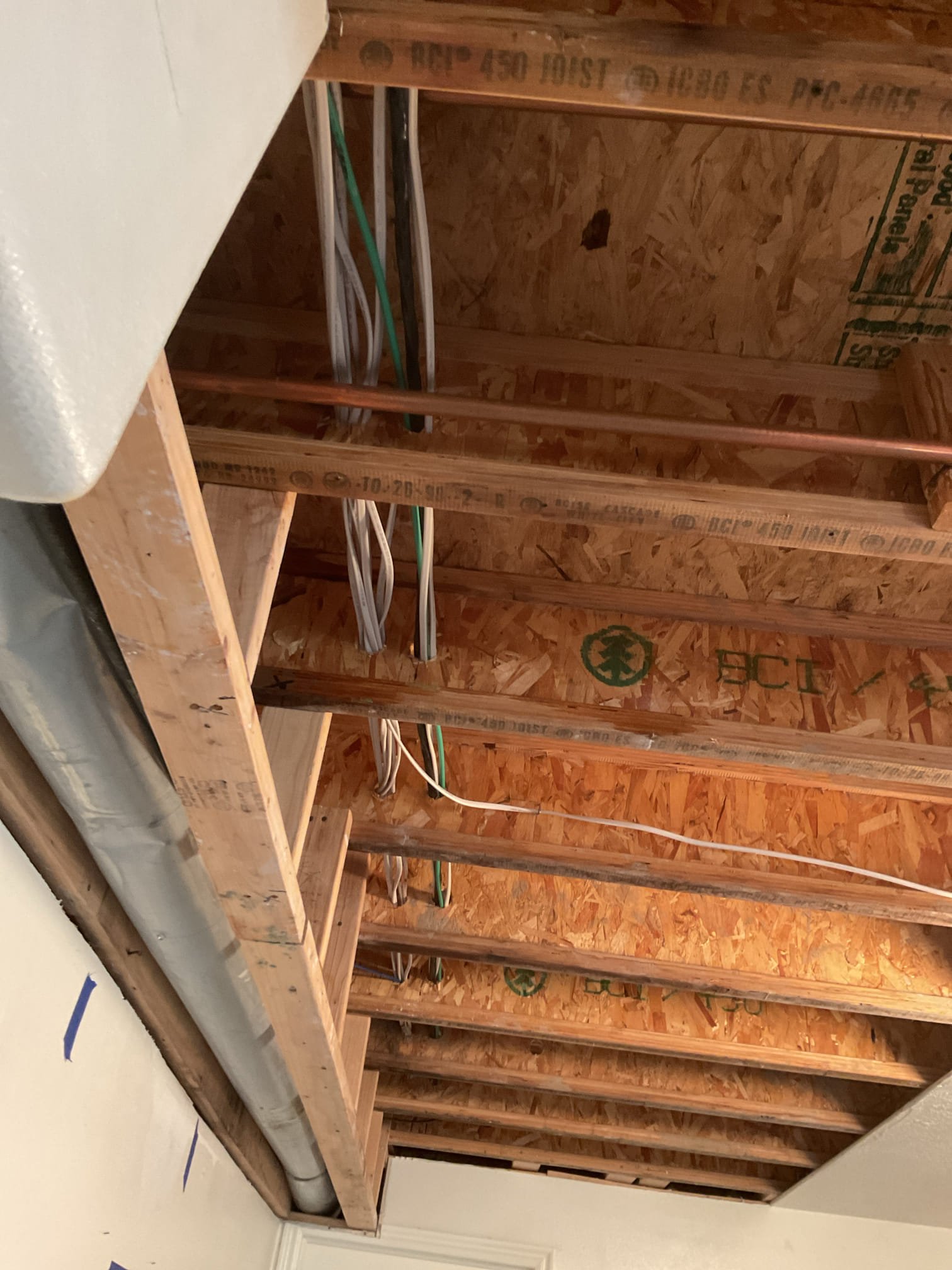 Image of a sparkling faucet dispensing clear water, contrasting with a chalky buildup on pipes in the background. Text overlay highlights benefits of water remediation: preventing scale damage, improving water quality, and avoiding costly repairs. Implies 'School Damage Remediation Austin' services can restore plumbing and protect infrastructure from hard water effects.