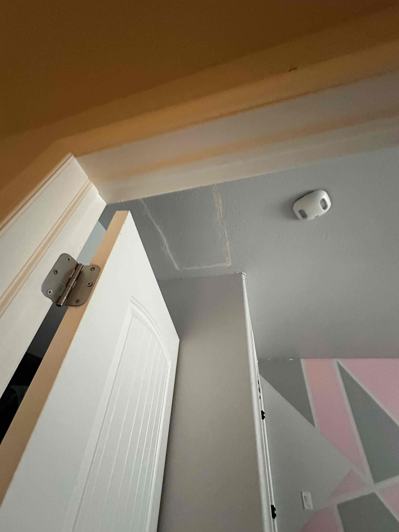 A modern, ductless 5-ton air conditioning system mounted on a wall, showcasing its sleek design and space-saving benefits. The absence of bulky ductwork highlights its easy installation and suitability for targeted cooling, implying 'ductless air conditioner near me' solutions. The image emphasizes quiet operation and energy efficiency, key advantages of a ductless system.