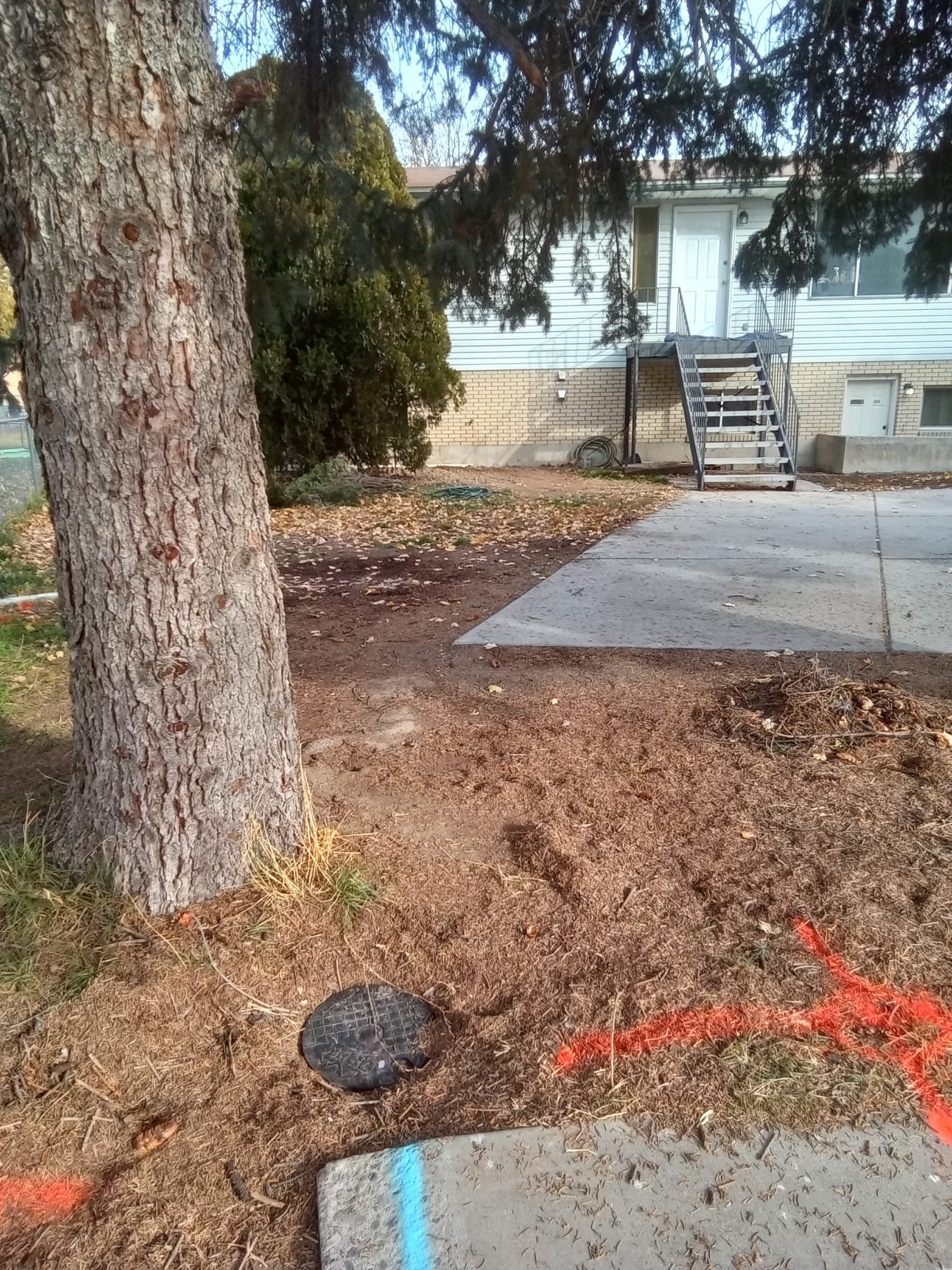 A water heater technician inspects a hot water heater. Regular water heater inspection and maintenance by qualified technicians ensures efficient operation and prevents costly repairs.