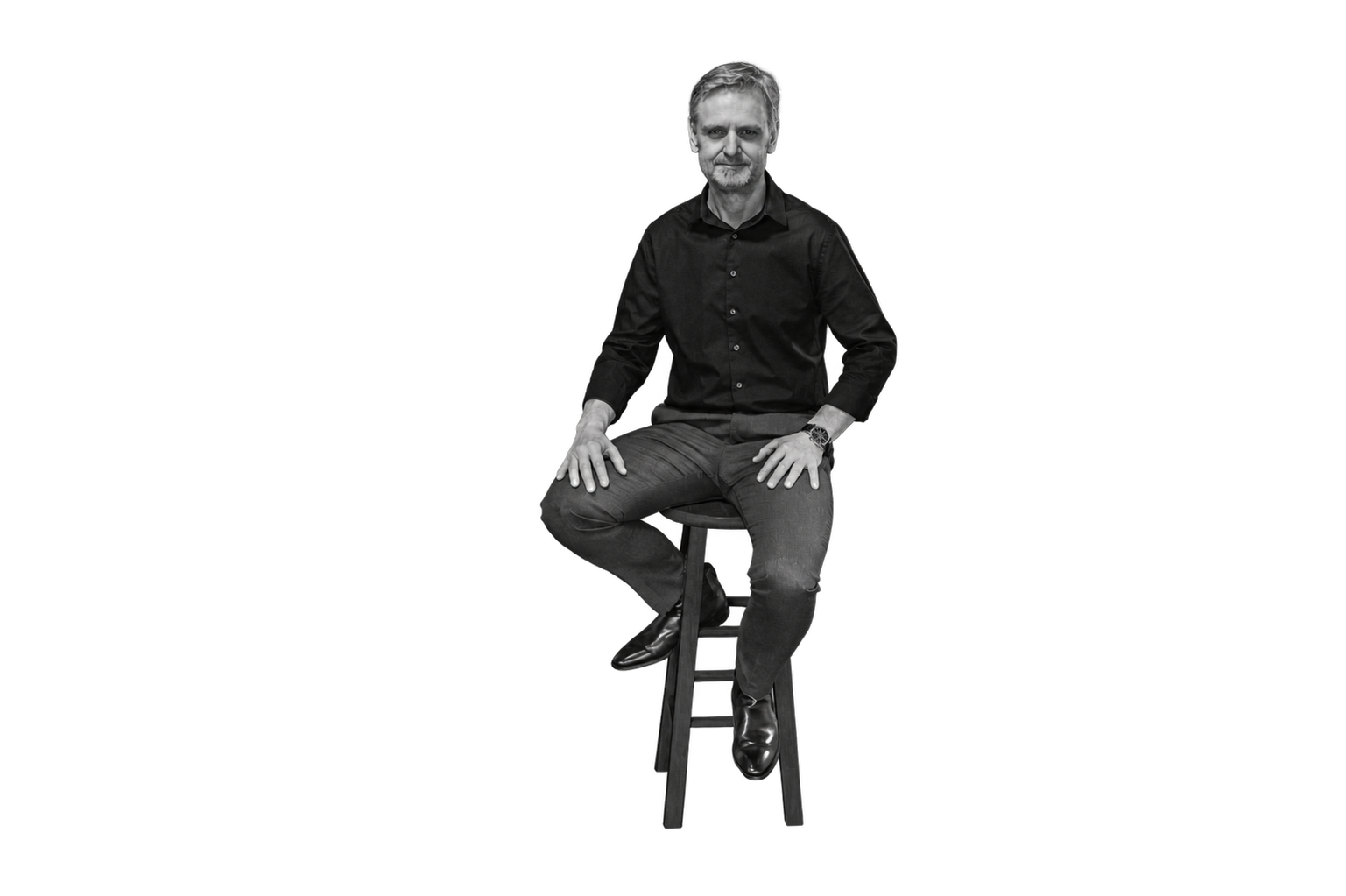Black-and-white portrait of Chris Piorkowski with the background removed
