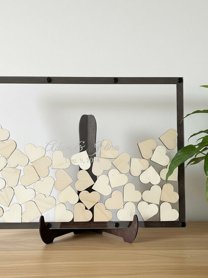 Alternative Guestbook with heart shaped tokens for guests to sign