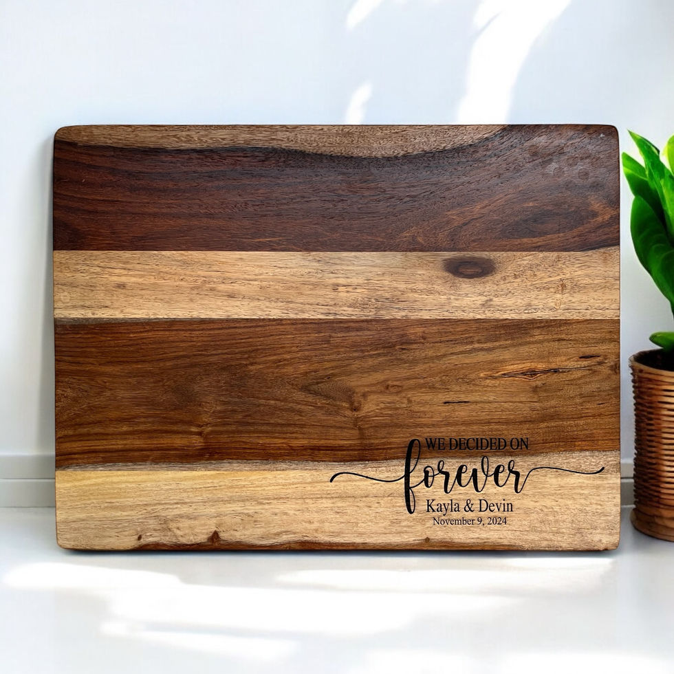 Wooden cutting boards with "we decided on forever" and names and date engraved.