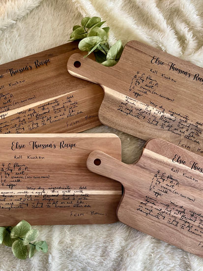 Wooden cutting boards with engraved recipe.