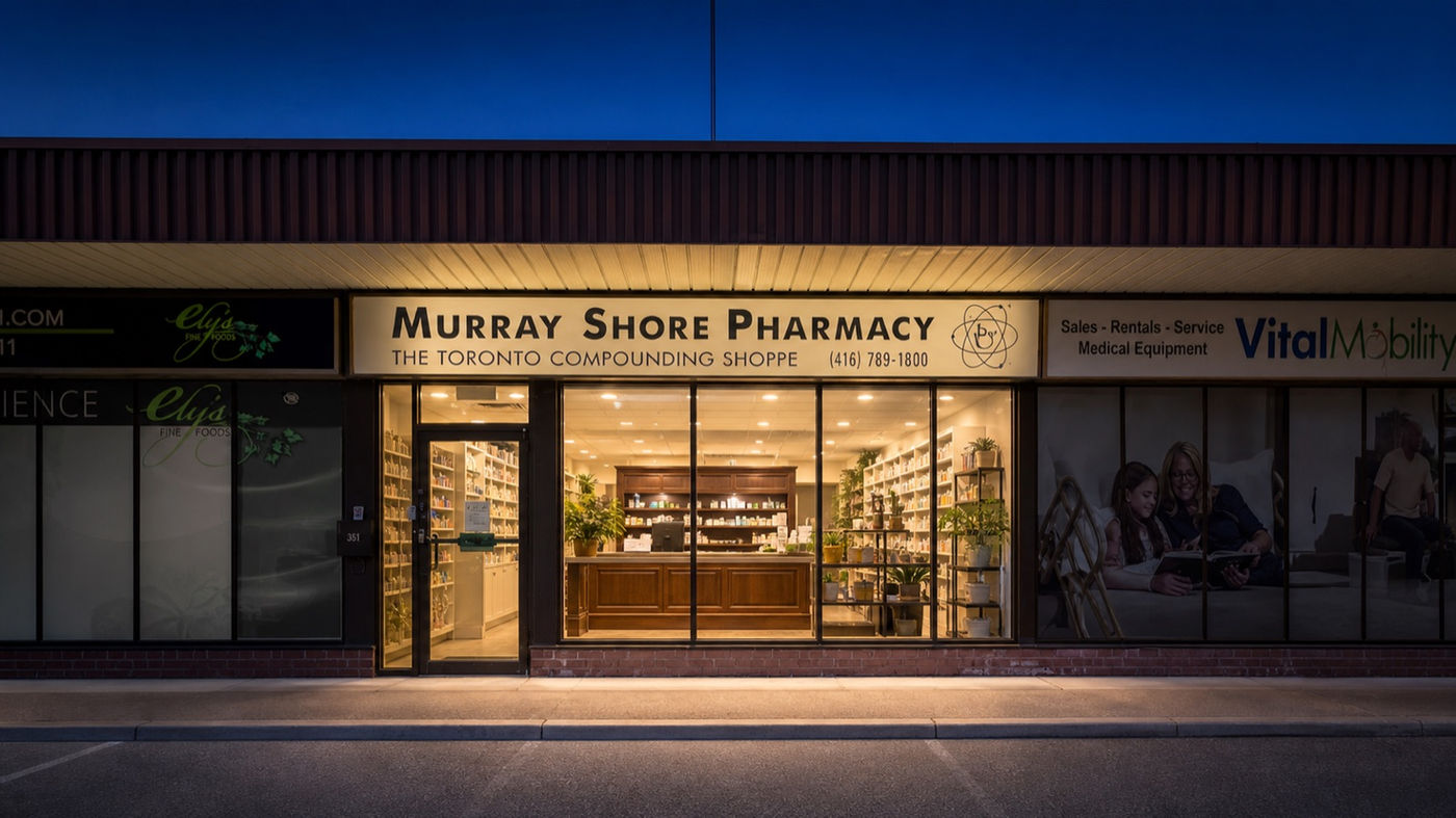 Murray Shore Pharmacy storefront in the evening