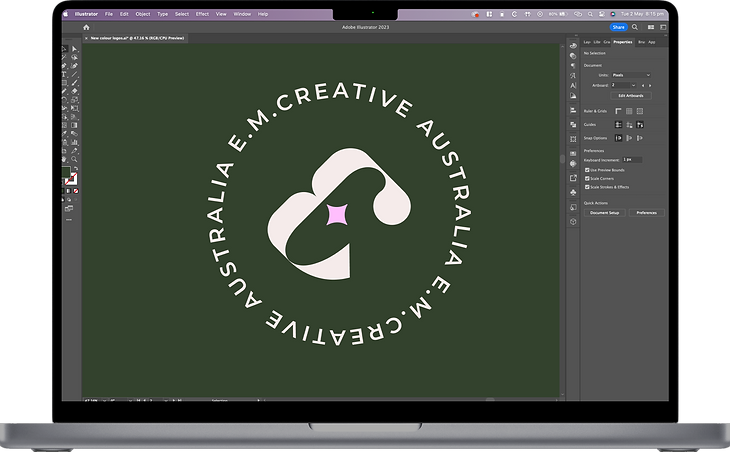 Macbook Pro M1 Max with E. M. Creative logo open in adobe illustrator