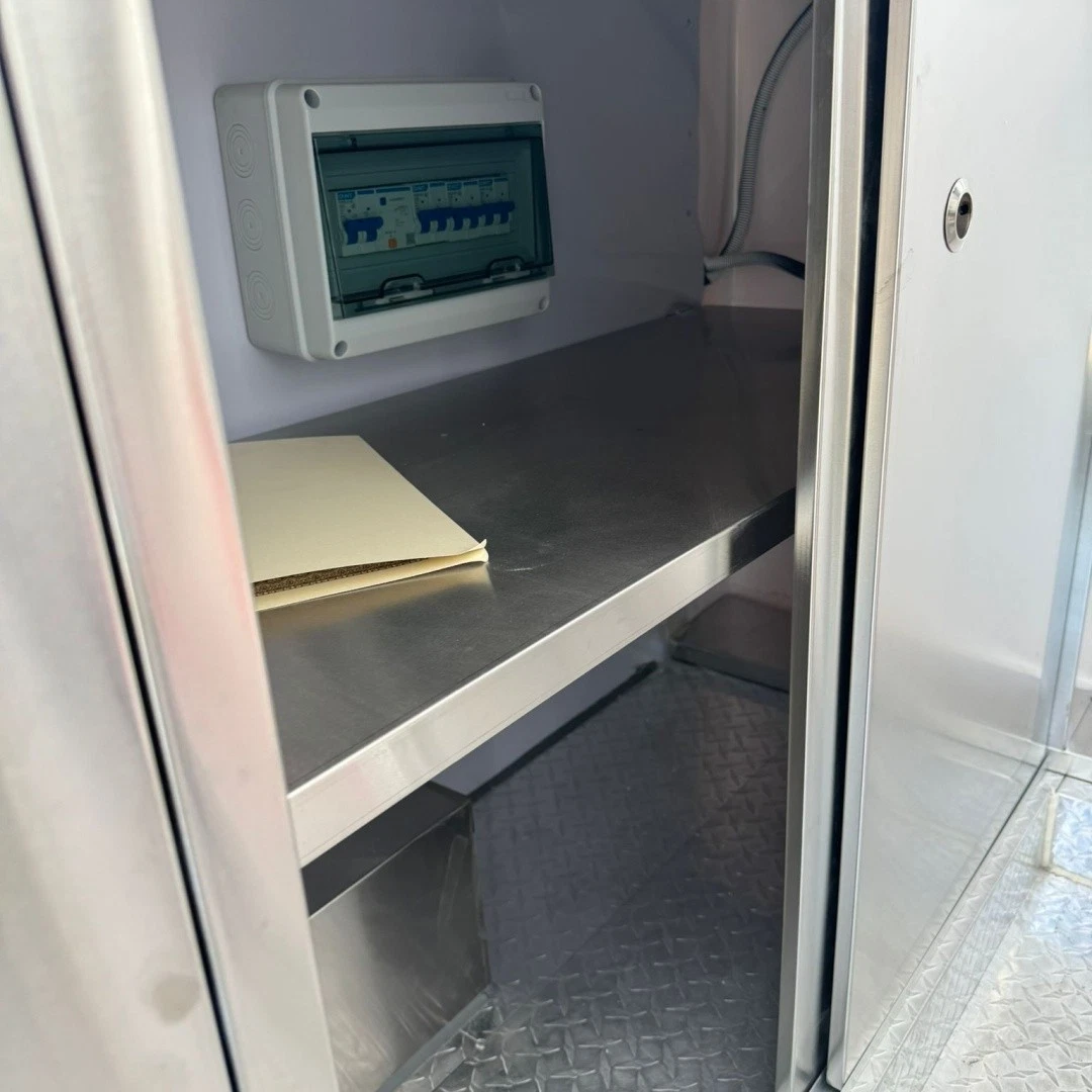 2026 Empire Trailers Black Mobile Catering Food Trailer Single Axle Serving Hatch Stainless Interior kitchen trailers for sale — photo 6 of 6 | Prime Trail Trailers
