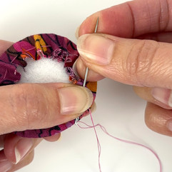 Knotting hand sewing thread with needle