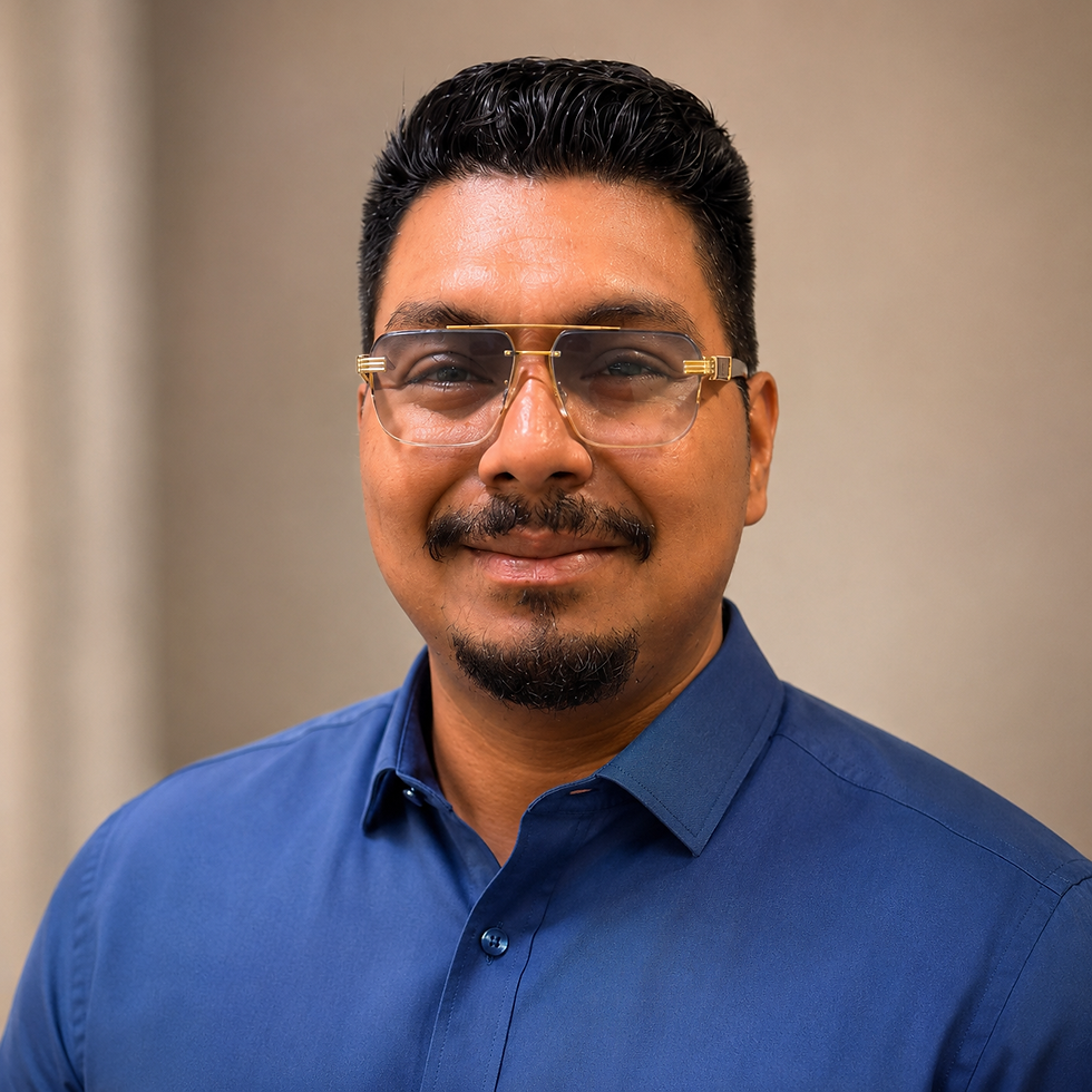 Confident Blue-Shirt Professional Portrait.png