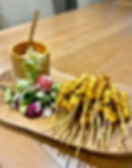 Singapore Chicken Satay on bamboo plate