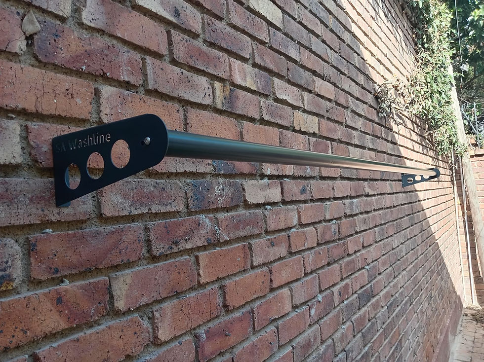 SA Washline's Rug and Blanket Drying bar mounted on a facebrick wall.