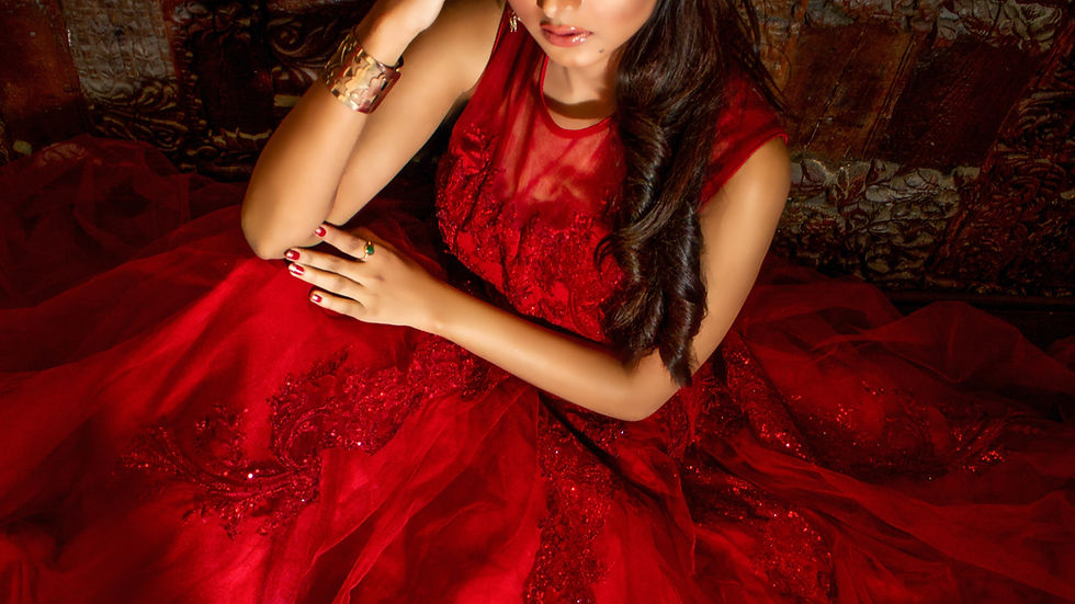 A woman wearing a red silk dress