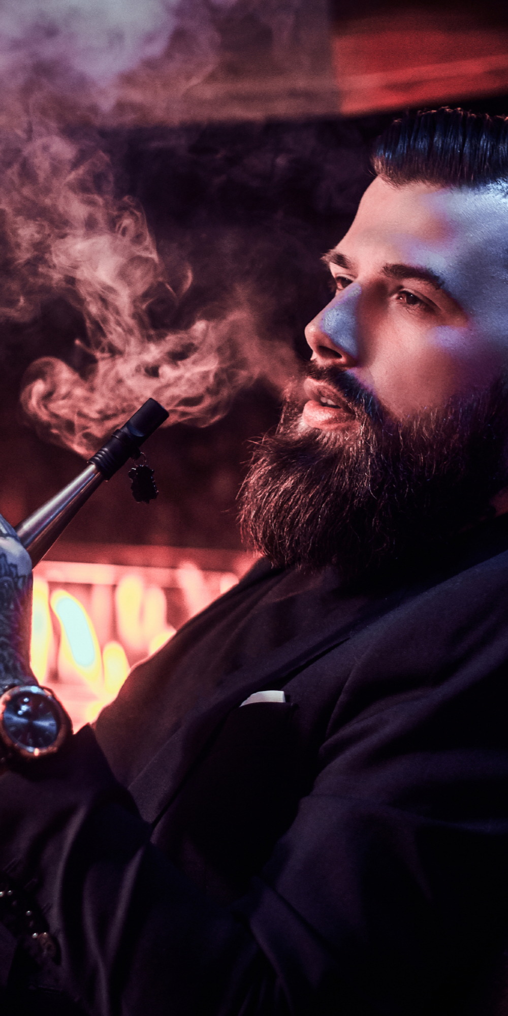 Elegantly designed premium hookah setup in a relaxed lounge environment.
