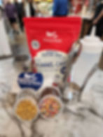Product: Funnel Cake Dry Mix Kit showing mix with szueeze bottle, sprinkles, powdered sugar shaker, and funnel cake mold.