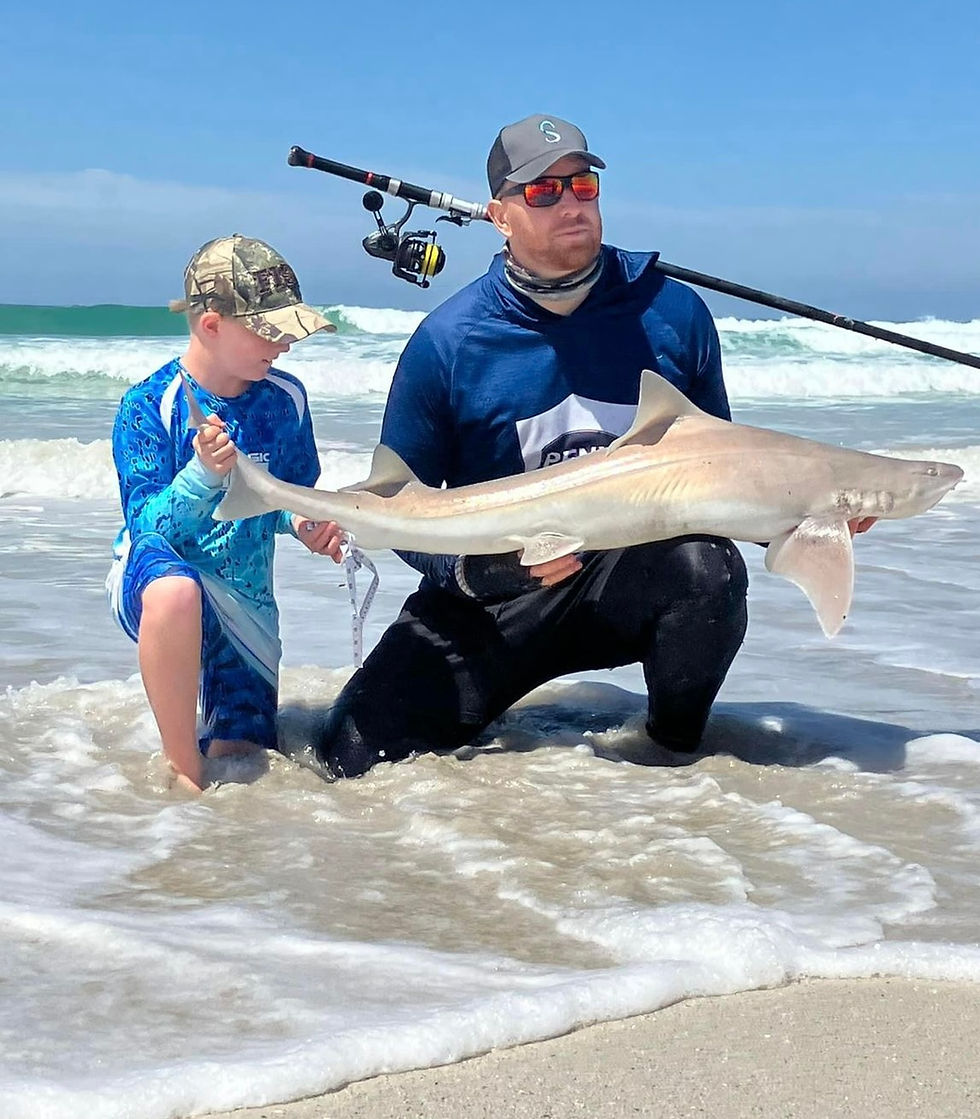 Victor and Jonah with a Smooth Hounds shark