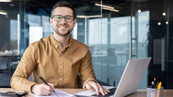 Happy business professional male