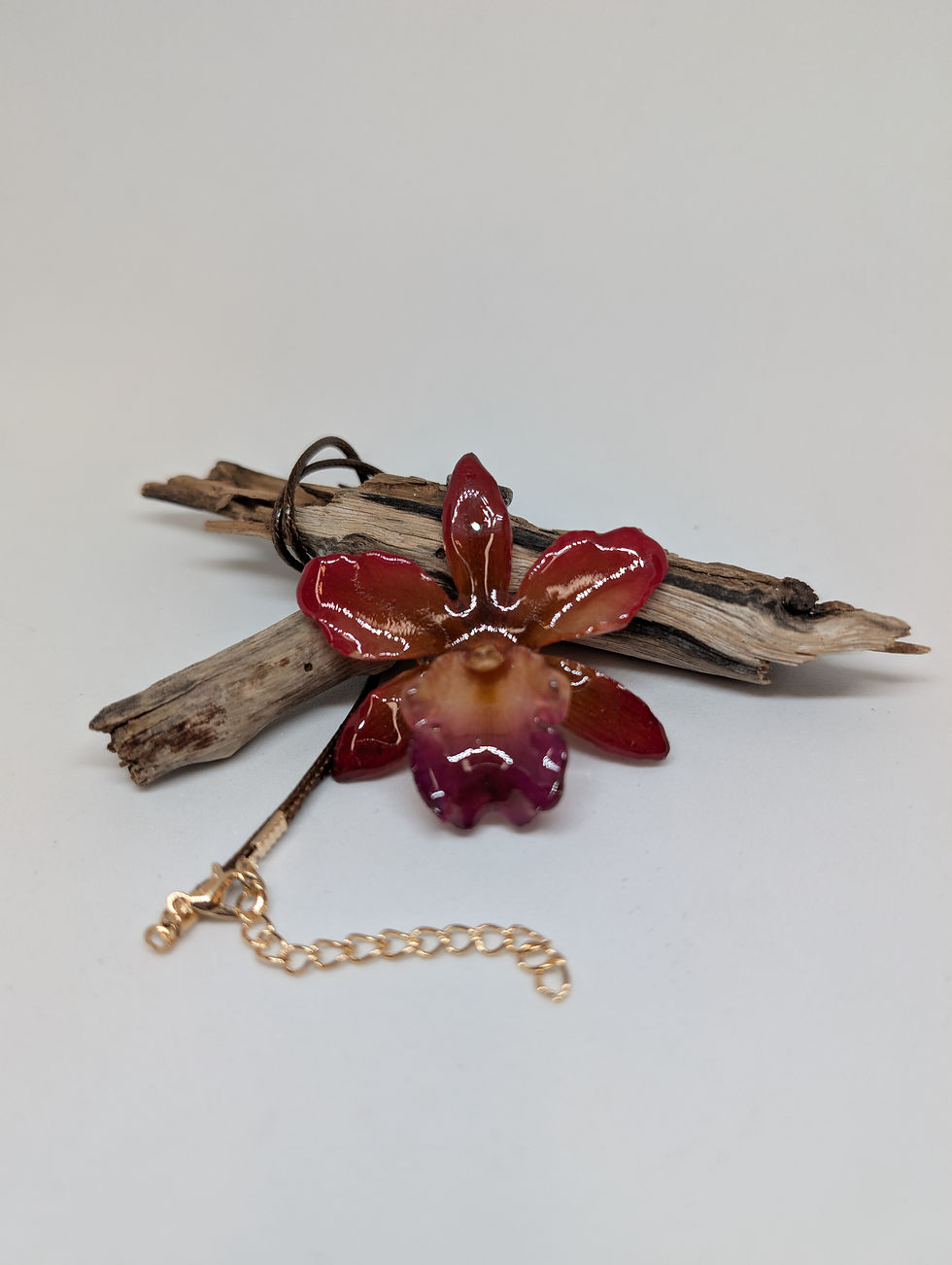 Thumbnail: Red Orchid flower In Resin with Leather chain