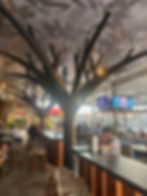 Metallic trees designed in Michigan on the patio of Jackson's Bistro - offering ambiance to one of the best waterfront restaurants in Tampa.