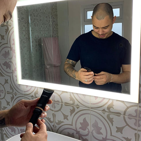 Man looking at men's makeup