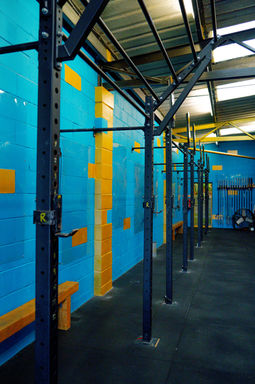 Squat rig running along the walls at WhiteHart CrossFit, Pulborough