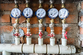 water-meters-multiple-house-residential-repair-bills.jpg