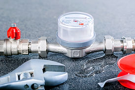 water-meter-with-leak-water-wrench-concept-broken-pipeline-meter.jpg