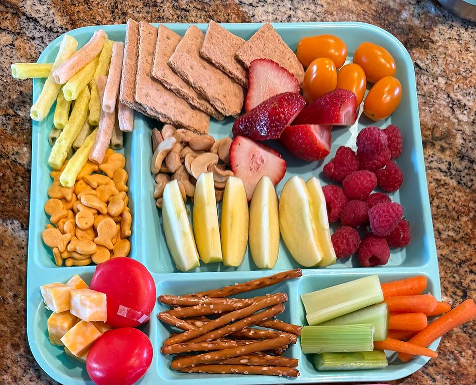 kid friendly charcuterie board for dinner with lots of fruit and veggies