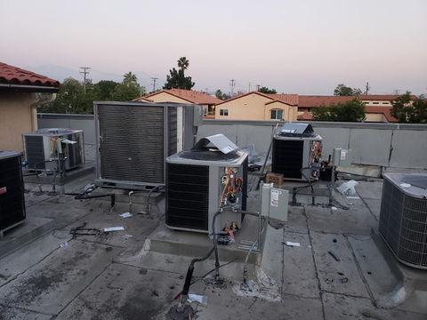 Sharony HVAC Services: Array of rooftop AC units providing reliable cooling solutions.