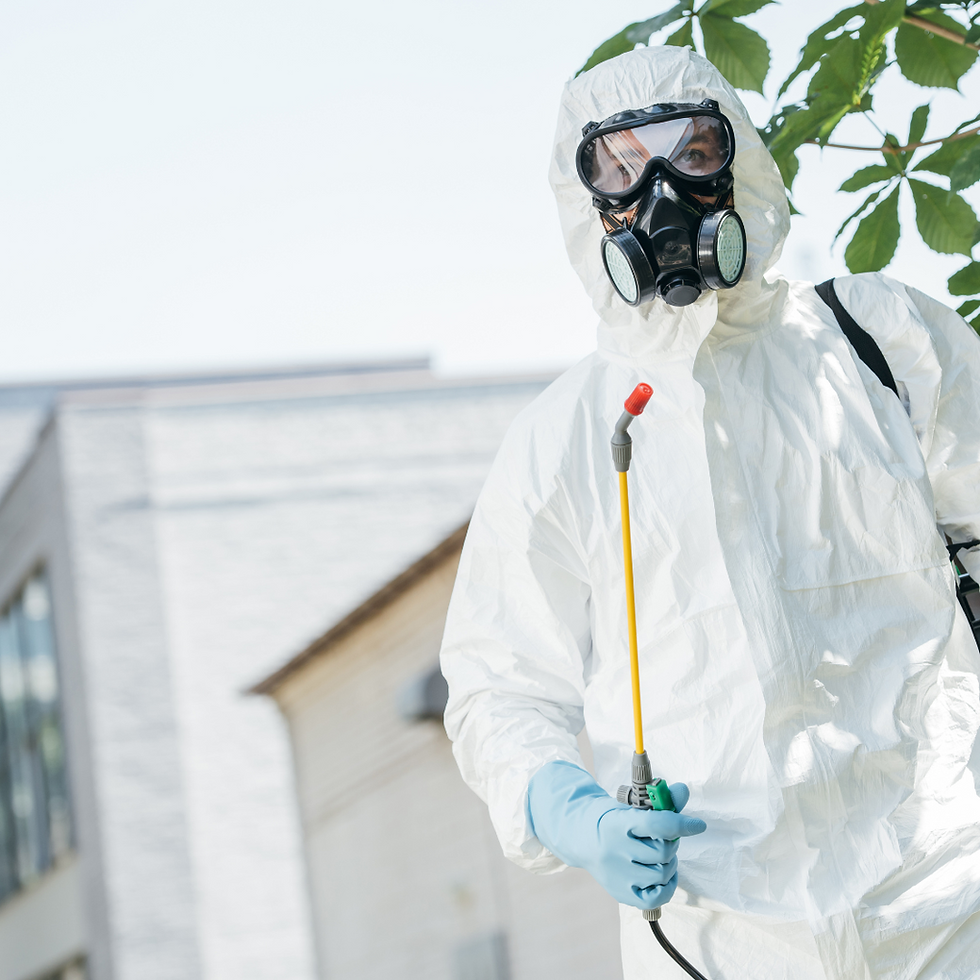Image of a pest control professional holding his specialized tools. He stands confidently in his uniform and safety gear, his equipment reflecting the nature of his work. The image conveys a sense of readiness and expertise in addressing pest-related issues.