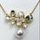 Thumbnail: Gold Floral Mother-of-Pearl Pearl Drop Pendant Necklace LUA Jewels