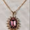 Thumbnail: Rose Gold Oval Crystal Halo Pendant Necklace