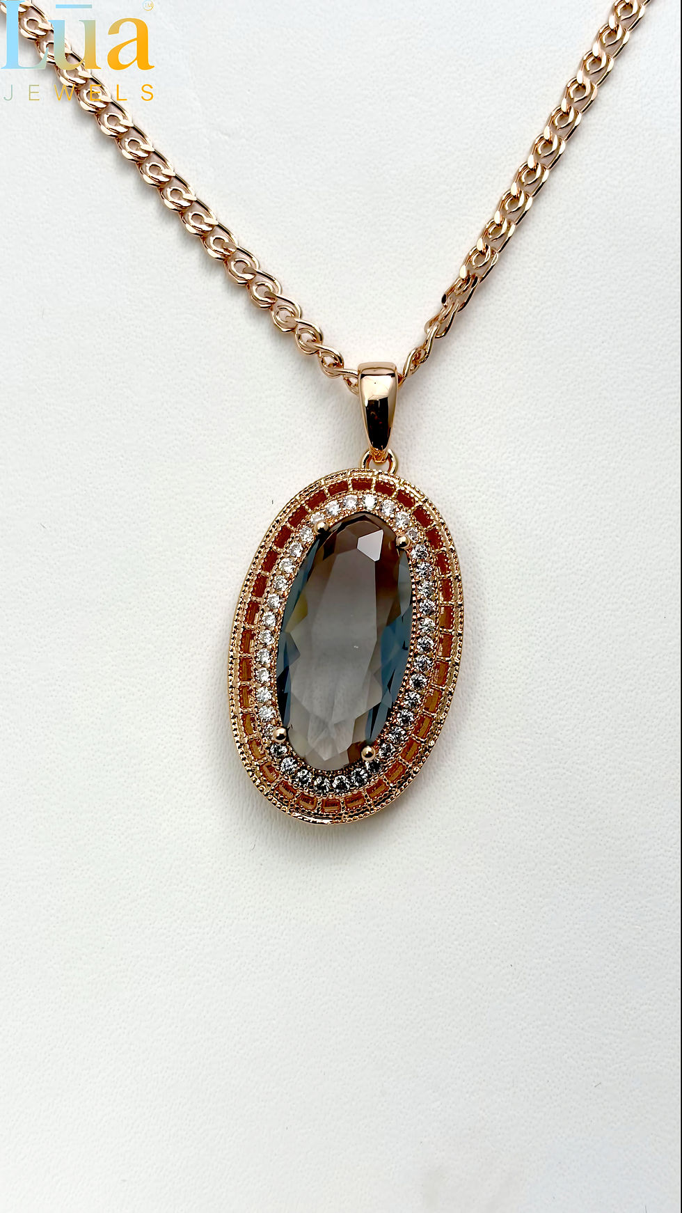 Thumbnail: Gold Oval Dark Crystal Halo Pendant Necklace LUA Jewels