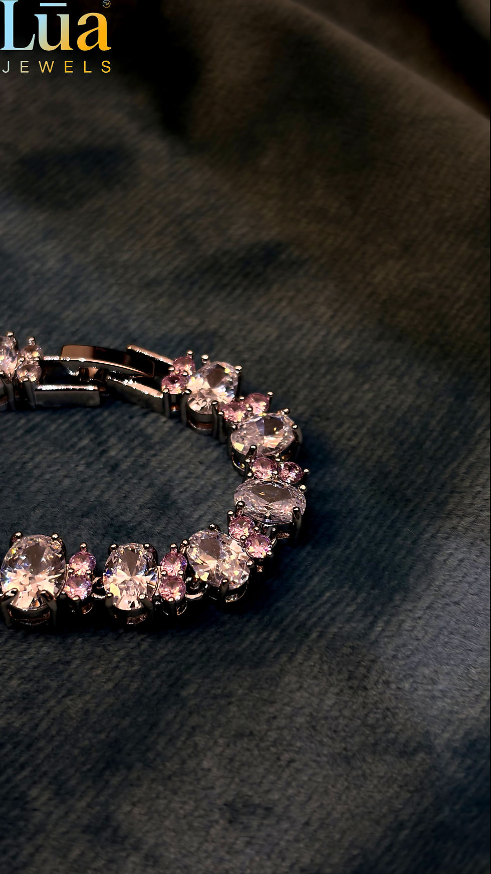 Thumbnail: Elegant Silver Oval Bracelet with Pink Sparkle Accents