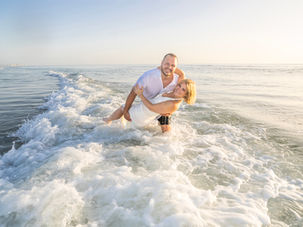 Engaged couple at beach in Florida
