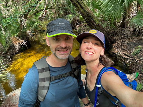 husband and wife on a hike