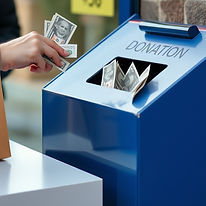 putting money in a donation box.jpg