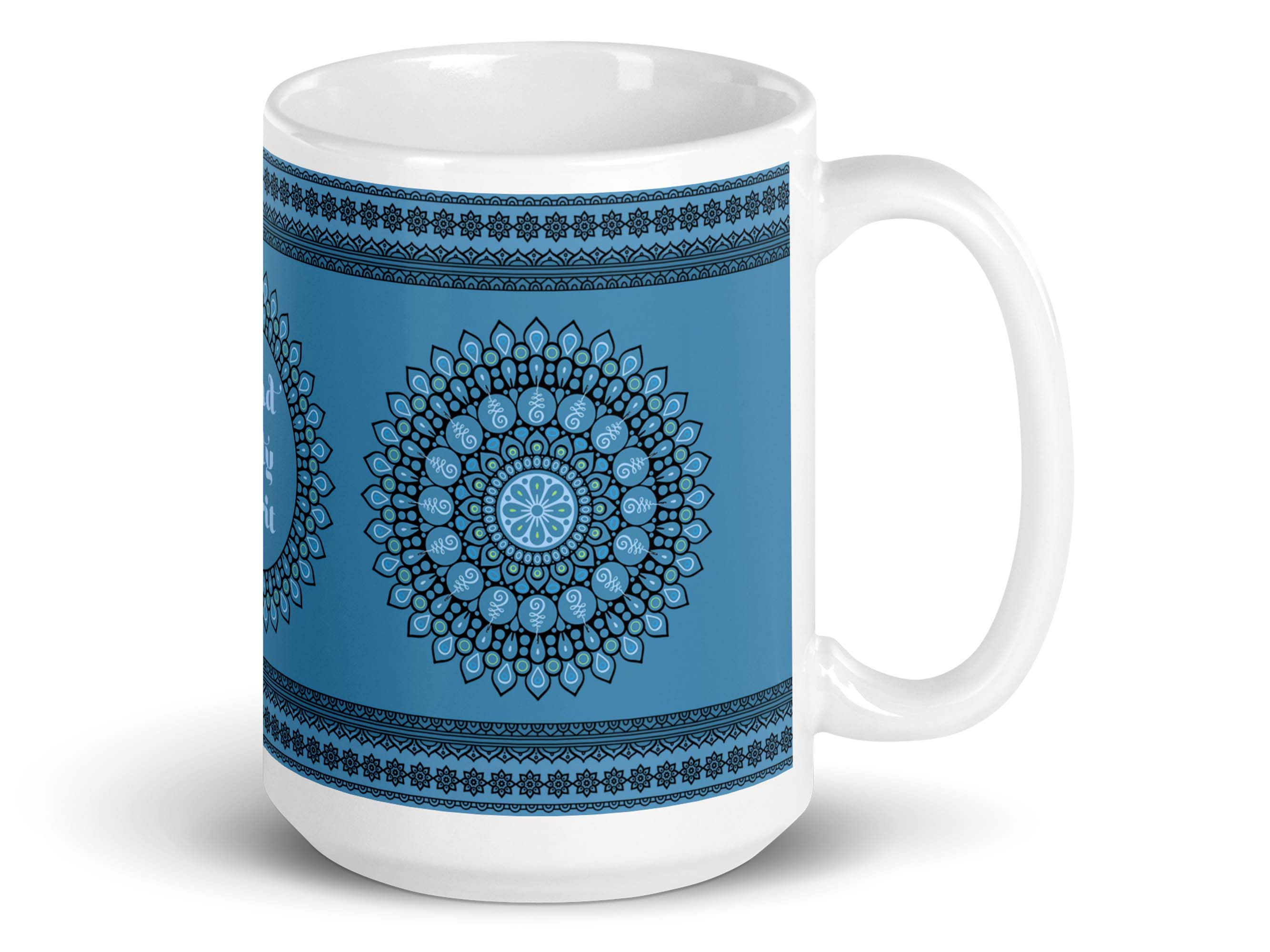 Mandala (rustic blue) coffee mug right side. A big blue Mandala with row of geometric symbols on top and bottom of mug.