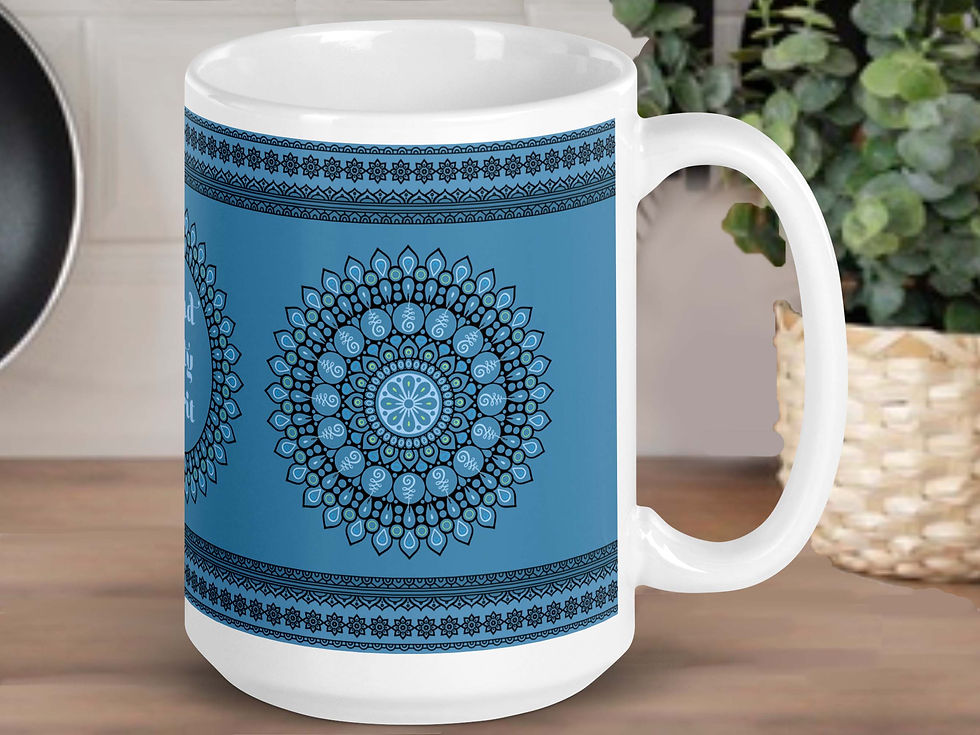 Thumbnail: A Mandala (rustic blue) coffee mug is sitting on a kitchen counter. A potted green plant is behind it.