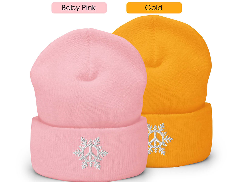 Thumbnail: Two beanie hats (pink and gold). Design features embroidered white snowflake with a white peace sign in center of snowflake
