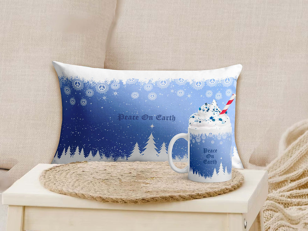 Throw pillow on beige couch. Blue background, white trees and white peace symbol snowflakes with words “Peace on Earth”.
