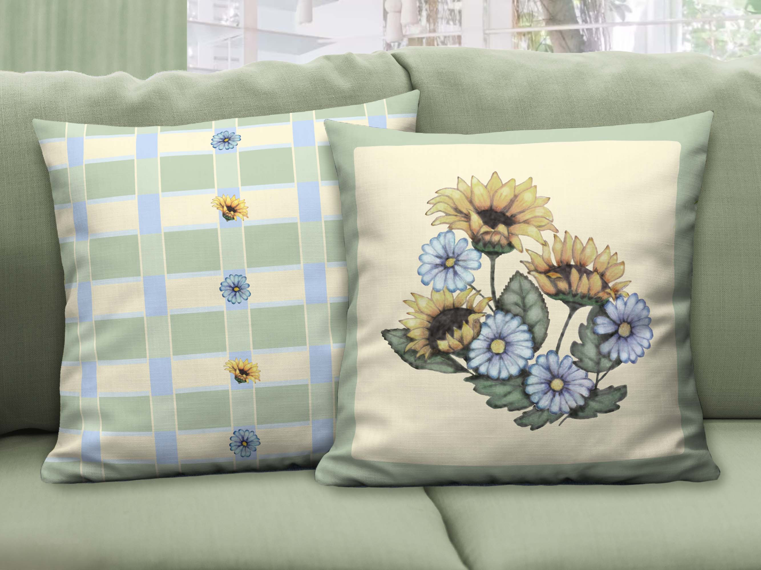 Two 22”x22” Sunflower Synergy throw pillows on green couch. One is front side (sunflowers), one is back side (green plaid).