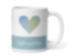 Light and Love mug right side. White mug, Big blue/green heart, blue stripe on bottom with white text “Light and Love”.