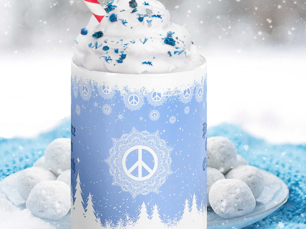 Thumbnail: A Peace on Earth Christmas coffee mug on a plate with white cookies. The mug is filled with whip cream and sprinkles.