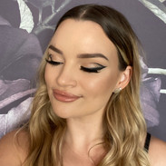 graphic liner soft glam makeup nude lip.