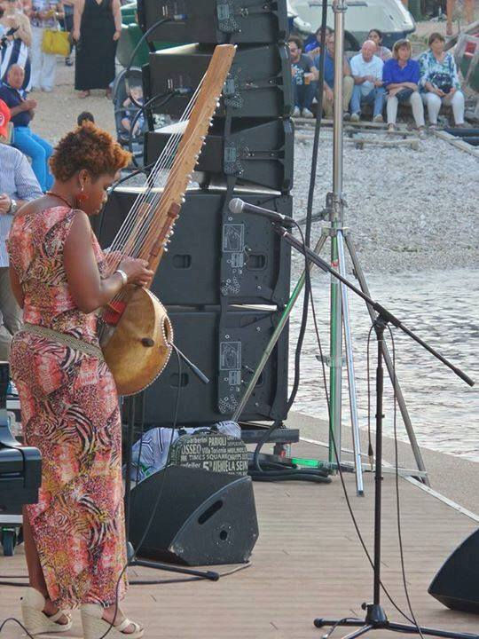 Guylene Solon Female Kora Player New York Haitian American   - Vocalist - Composer - Dancer -  Virtuoso Kora player