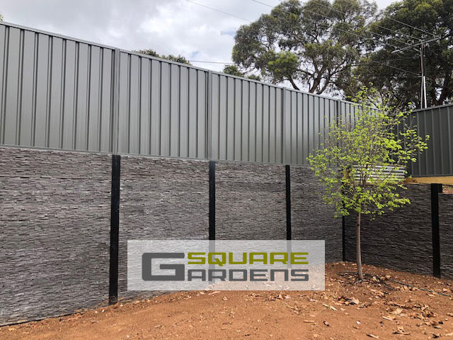 Retaining wall with textured sleepers, Square Gardens Adelaide landscaping company