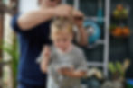 Father Combing Daughter's Hair