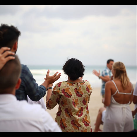 Christian community worship outside at the beach.jpg