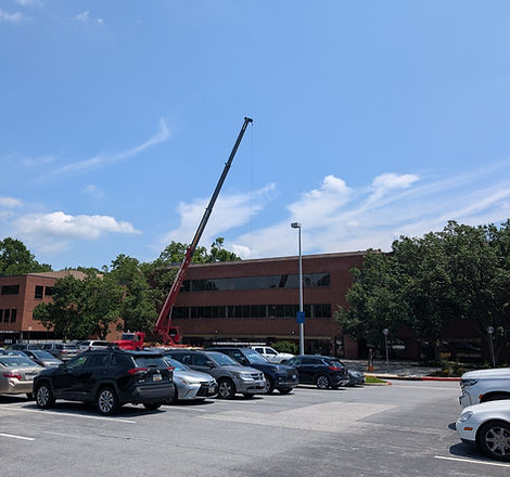 Commercial retail center with multiple tenants and parking lot