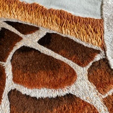 Giraffe embroidery will be for sale when it is framed, please email for information
