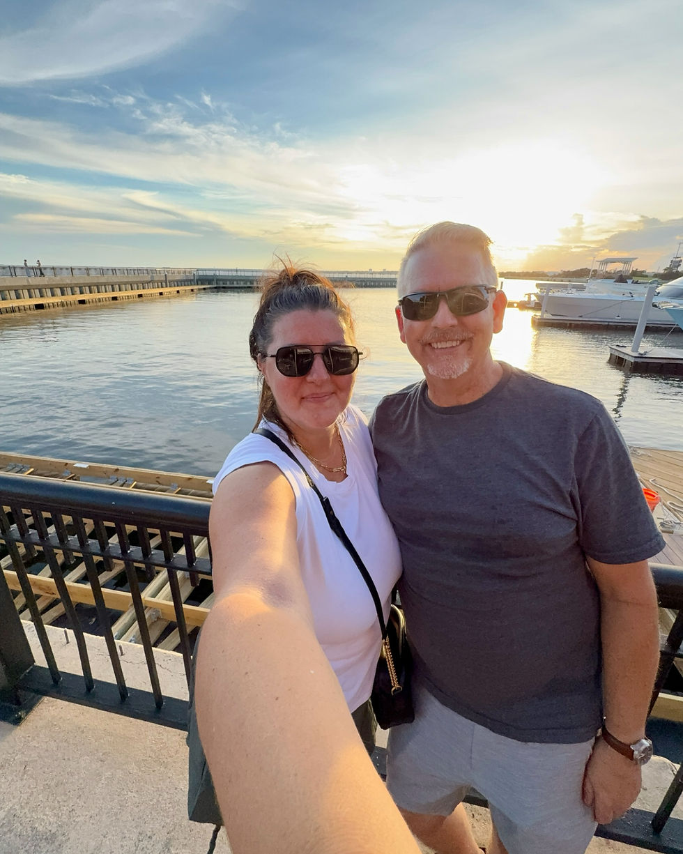 Kari and Matt at sunset on the Pensacola waterfront